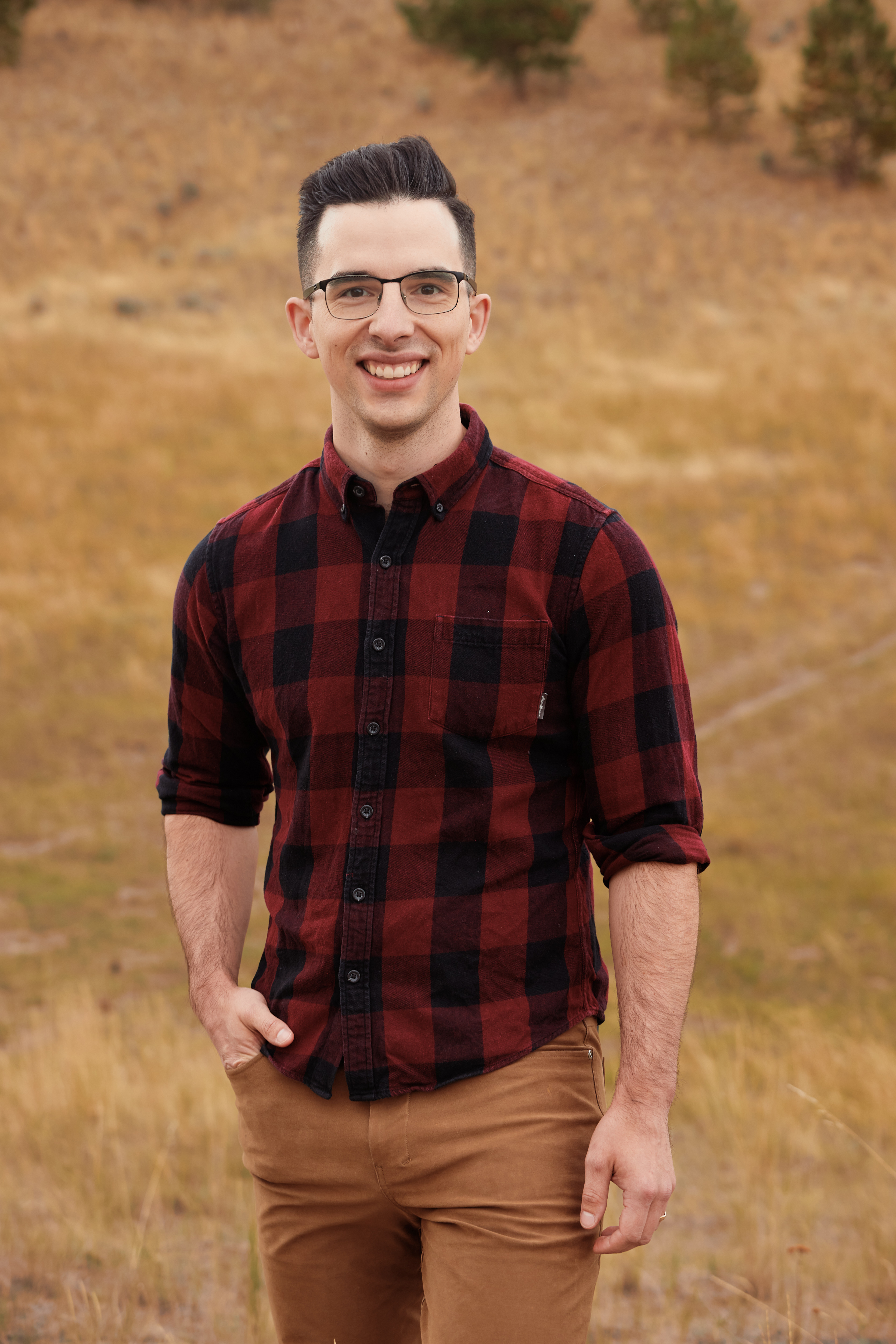 Dr. Doug Whitelaw standing in the hills above Kamloops